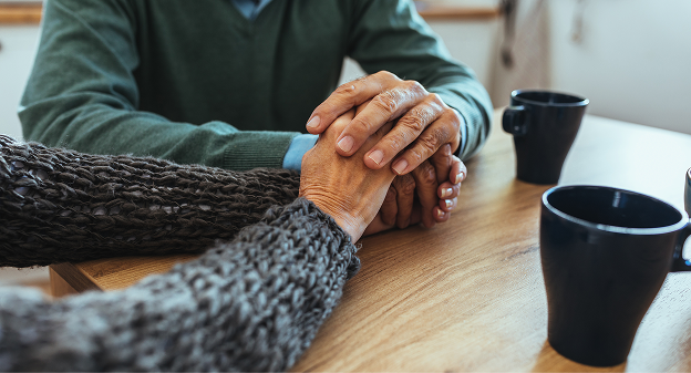 two people holding hands